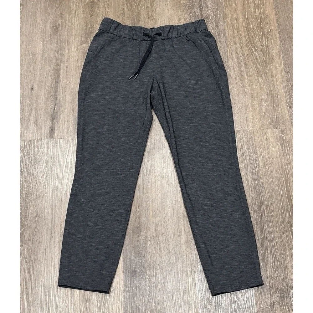 Lululemon On The Fly Pant Womens 6 Gray Heathered Black Pockets